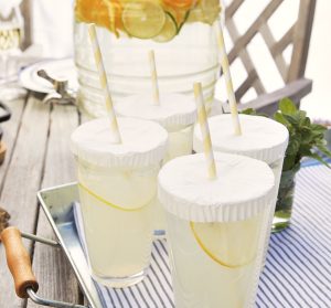cupcake liners over cups to keep bugs out